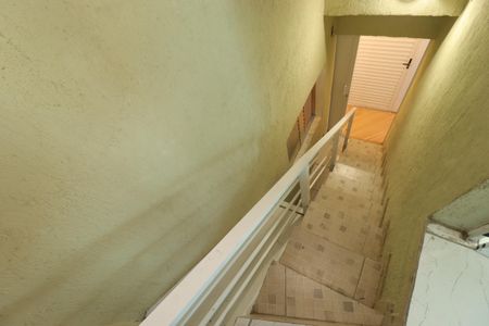 Casa para alugar com 454m², 4 quartos e 8 vagasEscada para a academia