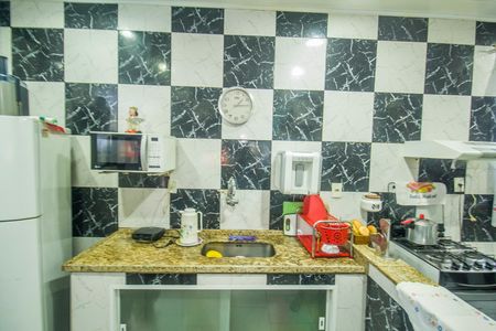 Casa à venda com 94m², 2 quartos e sem vaga Casa à venda com 94m², 2 quartos e sem vagaCozinha e Área de Serviço