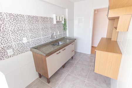Apartamento à venda com 58m², 2 quartos e 1 vaga Apartamento à venda com 58m², 2 quartos e 1 vagaCozinha e Área de Serviço