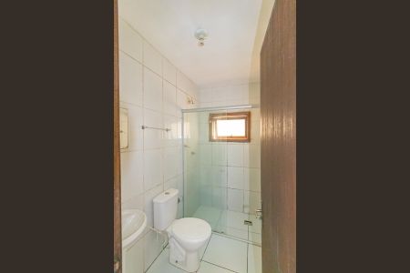 Banheiro da suíte de casa de condomínio para alugar com 2 quartos, 79m² em Rio Branco, Canoas