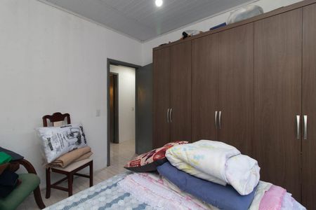 Quarto 1 de casa à venda com 3 quartos, 155m² em Restinga, Porto Alegre