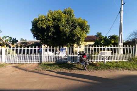 Fachada de casa à venda com 3 quartos, 155m² em Restinga, Porto Alegre