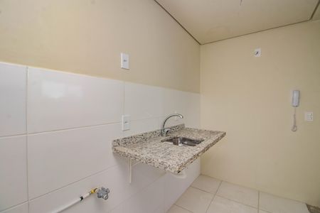 Apartamento à venda com 50m², 2 quartos e 1 vaga Apartamento à venda com 50m², 2 quartos e 1 vagaCozinha e Área de Serviço