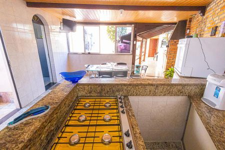 Casa à venda com 378m², 5 quartos e 6 vagas Casa à venda com 378m², 5 quartos e 6 vagascozinha gourmet