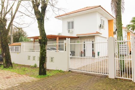 Fachada de casa de condomínio para alugar com 2 quartos, 69m² em Olaria, Canoas