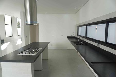 Casa de condomínio à venda com 375m², 4 quartos e 4 vagas Casa de condomínio à venda com 375m², 4 quartos e 4 vagasCozinha