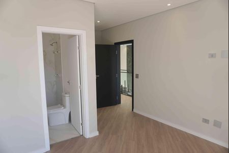Casa de condomínio à venda com 375m², 4 quartos e 4 vagas Casa de condomínio à venda com 375m², 4 quartos e 4 vagasSuite 1