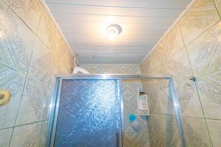 Banheiro social de casa à venda com 3 quartos, 297m² em Harmonia, Canoas