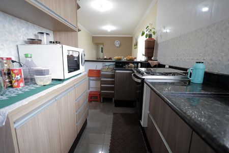 Casa à venda com 150m², 3 quartos e 2 vagas Casa à venda com 150m², 3 quartos e 2 vagasCozinha
