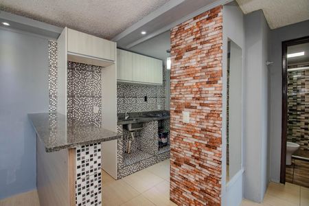 Apartamento à venda com 38m², 2 quartos e 1 vaga Apartamento à venda com 38m², 2 quartos e 1 vagaCozinha e Área de Serviço