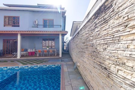 Casa de condomínio para alugar com 360m², 5 quartos e 5 vagas Casa de condomínio para alugar com 360m², 5 quartos e 5 vagasÁrea da piscina
