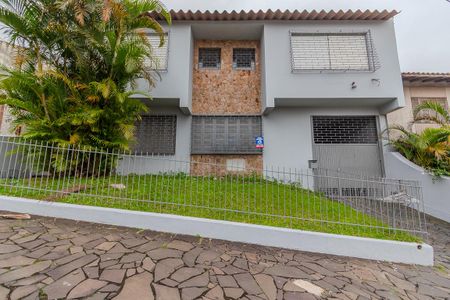 Fachada de casa à venda com 3 quartos, 220m² em Partenon, Porto Alegre