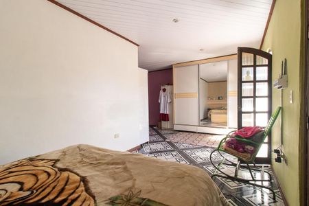 Casa à venda com 200m², 4 quartos e 2 vagas Casa à venda com 200m², 4 quartos e 2 vagasQuarto 2 - Suíte