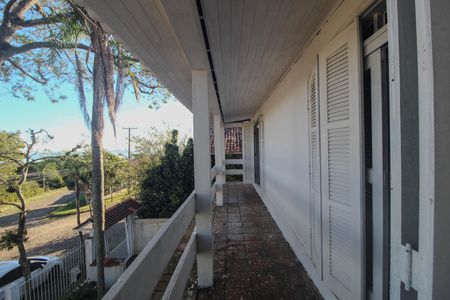 Varanda de casa à venda com 3 quartos, 216m² em Espírito Santo, Porto Alegre