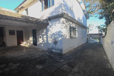 garagem quintal/area de serviço de casa à venda com 3 quartos, 216m² em Espírito Santo, Porto Alegre