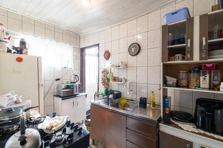 Cozinha e Área de serviço de apartamento à venda com 2 quartos, 50m² em Restinga, Porto Alegre