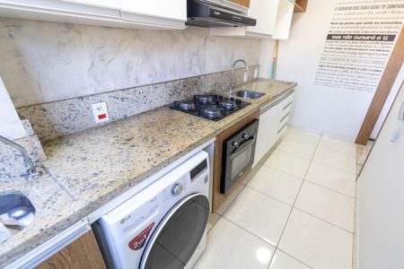 Apartamento à venda com 44m², 2 quartos e 1 vaga Apartamento à venda com 44m², 2 quartos e 1 vagaCozinha e Área de Serviço