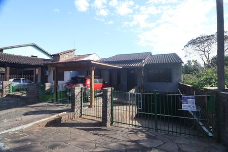 Casa à venda com 182m², 3 quartos e 3 vagasFachada e Placa