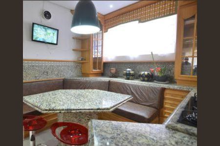 Casa para alugar com 700m², 11 quartos e 4 vagas Casa para alugar com 700m², 11 quartos e 4 vagasCozinha