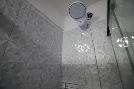 Casa de condomínio para alugar com 420m², 4 quartos e 2 vagasBanheiro da Suíte 3