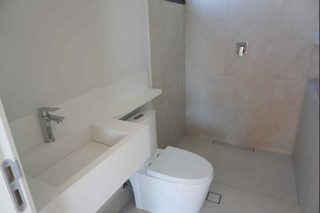 Casa de condomínio para alugar com 300m², 4 quartos e 4 vagasBanheiro da Suíte 1