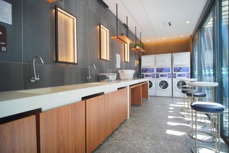 Área Comum - Lavanderia de kitnet/studio para alugar com 1 quarto, 69m² em Auxiliadora, Porto Alegre