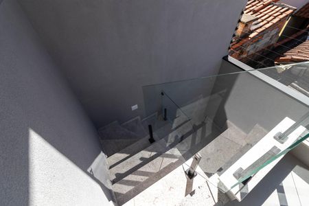 Casa à venda com 145m², 3 quartos e 2 vagas Casa à venda com 145m², 3 quartos e 2 vagasVaranda da Cozinha - Escada