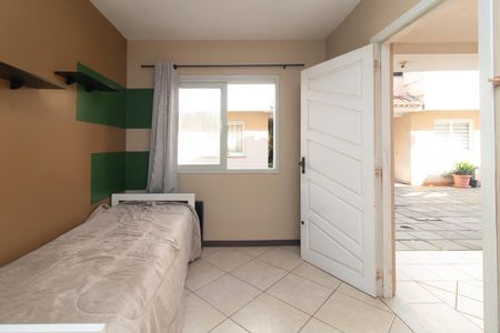 Sala de casa de condomínio para alugar com 3 quartos, 100m² em Guarujá, Porto Alegre