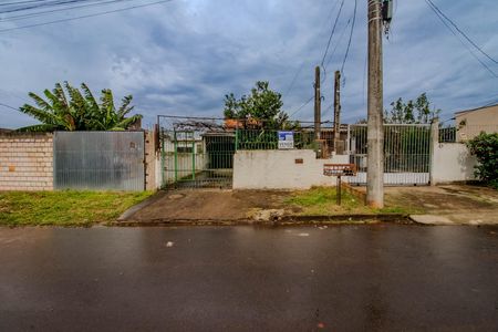 Fachada de casa à venda com 2 quartos, 50m² em Mário Quintana, Porto Alegre