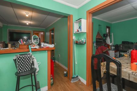 Cozinha de casa à venda com 4 quartos, 155m² em Santa Maria Goretti, Porto Alegre