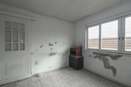 Sala 2 de casa à venda com 4 quartos, 155m² em Santa Maria Goretti, Porto Alegre