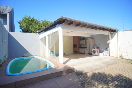 Piscina de casa à venda com 3 quartos, 122m² em Vicentina, São Leopoldo
