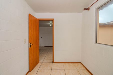 Quarto 1 de apartamento para alugar com 2 quartos, 39m² em Mário Quintana, Porto Alegre