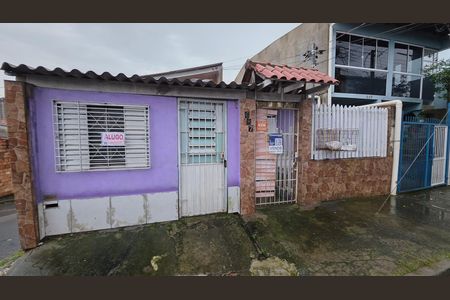 Fachada de casa à venda com 3 quartos, 149m² em Passo das Pedras, Porto Alegre