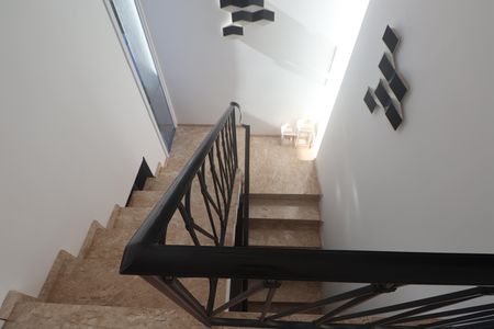 Casa de condomínio para alugar com 276m², 4 quartos e 4 vagasEscada