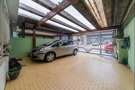 Garagem de casa à venda com 3 quartos, 169m² em Parque Industriario, Santo André