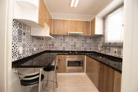 Casa à venda com 82m², 3 quartos e 2 vagas Casa à venda com 82m², 3 quartos e 2 vagasCozinha - Armários