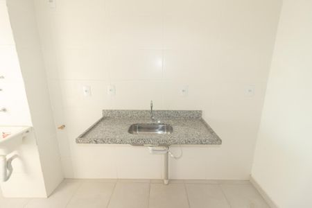 Apartamento à venda com 48m², 2 quartos e 1 vaga Apartamento à venda com 48m², 2 quartos e 1 vagaCozinha e Área de Serviço