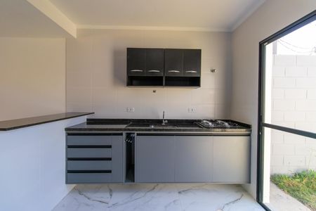 Casa de condomínio para alugar com 70m², 3 quartos e 2 vagas Casa de condomínio para alugar com 70m², 3 quartos e 2 vagasCozinha - Armários