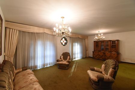 Casa à venda com 418m², 5 quartos e 4 vagasSala