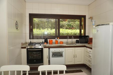 Casa de condomínio para alugar com 300m², 4 quartos e 2 vagasCozinha