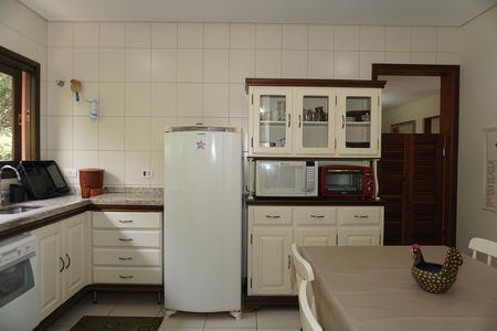 Casa de condomínio para alugar com 300m², 4 quartos e 2 vagasCozinha