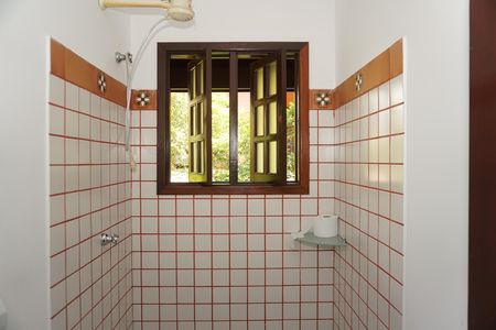 Casa de condomínio para alugar com 300m², 4 quartos e 2 vagasBanheiro Social