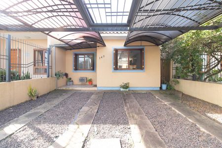 Fachada de casa à venda com 3 quartos, 150m² em Hípica, Porto Alegre