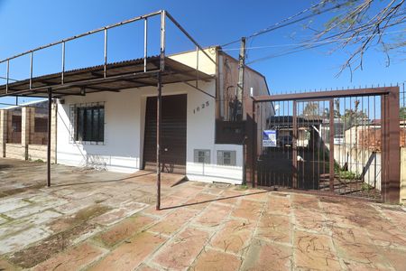 Fachada e placa de casa para alugar com 2 quartos, 70m² em Niterói, Canoas