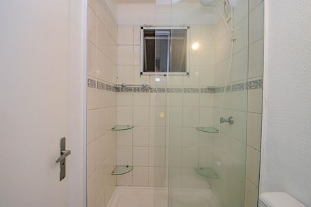 Banheiro da Suíte Americana / Corredor de casa de condomínio à venda com 3 quartos, 78m² em Sarandi, Porto Alegre