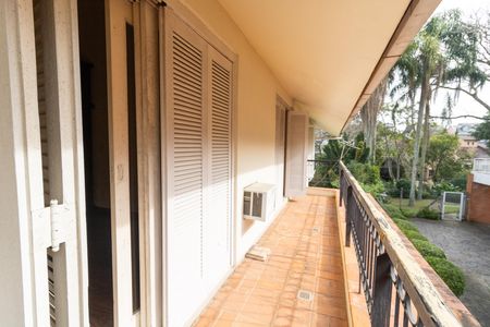Sacada de casa de condomínio à venda com 4 quartos, 363m² em Cavalhada, Porto Alegre