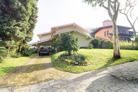 Fachada de casa de condomínio à venda com 4 quartos, 363m² em Cavalhada, Porto Alegre